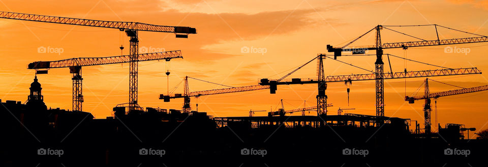 sky city construction sunset by chrille_b