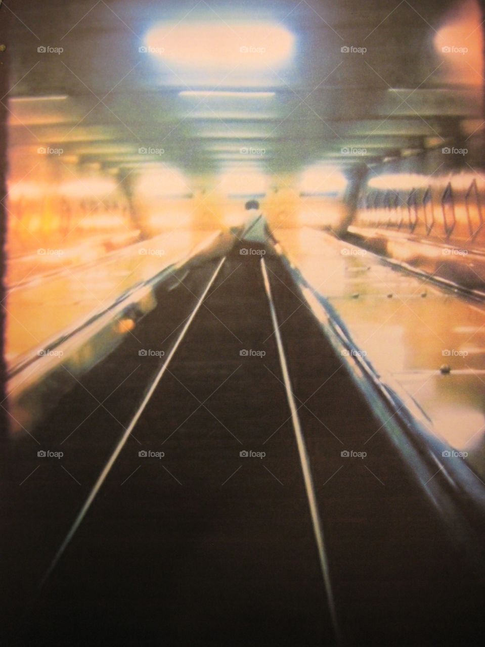 Escalator upp light blur steps