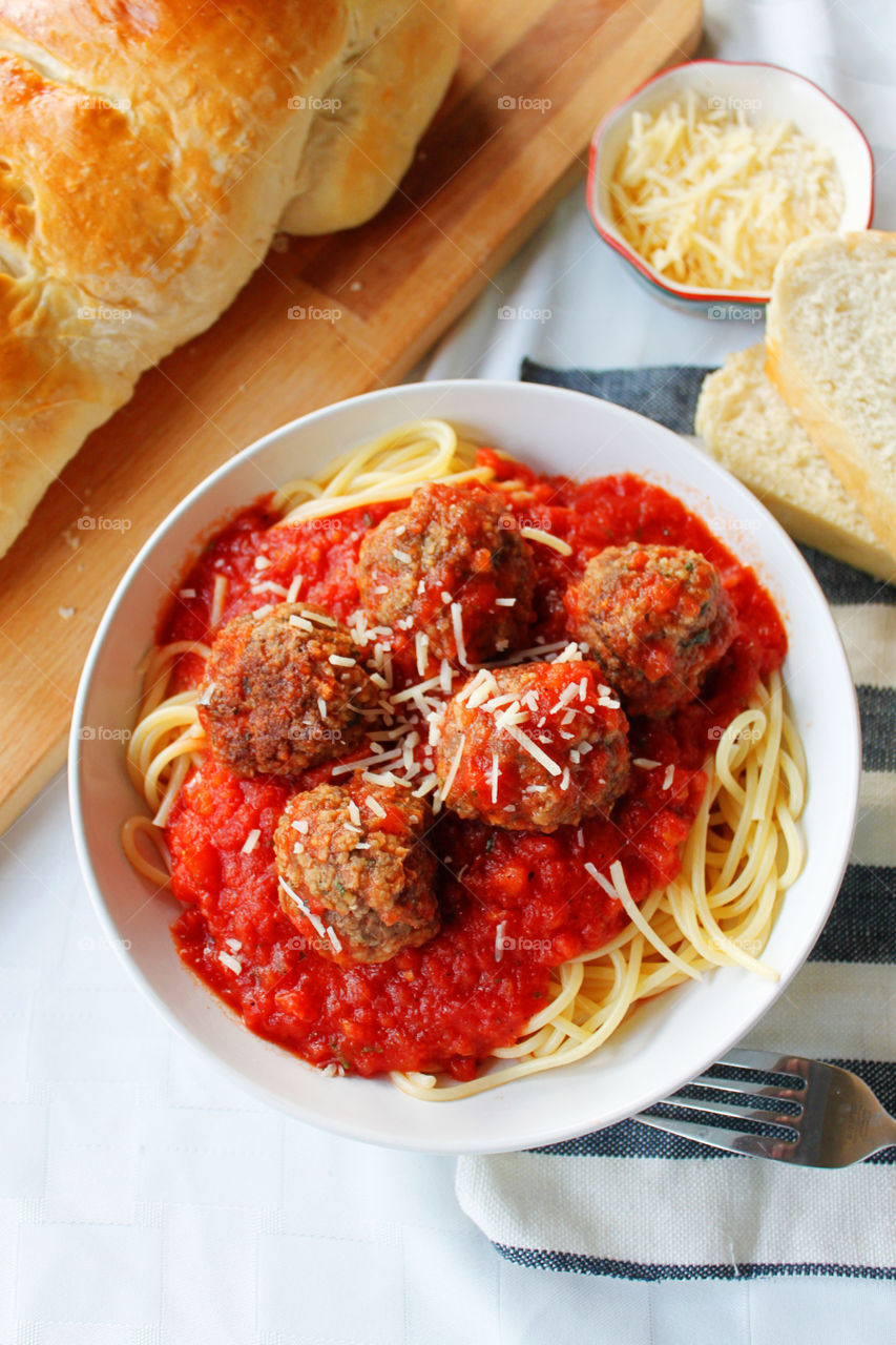 Spaghetti pasta with meatball in bowl
