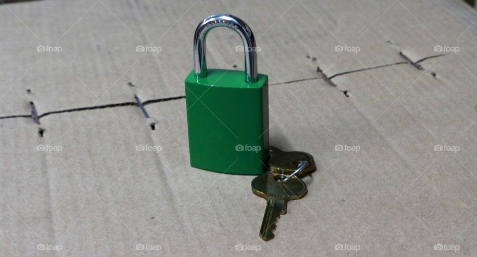Photo of a pair of locks and keys