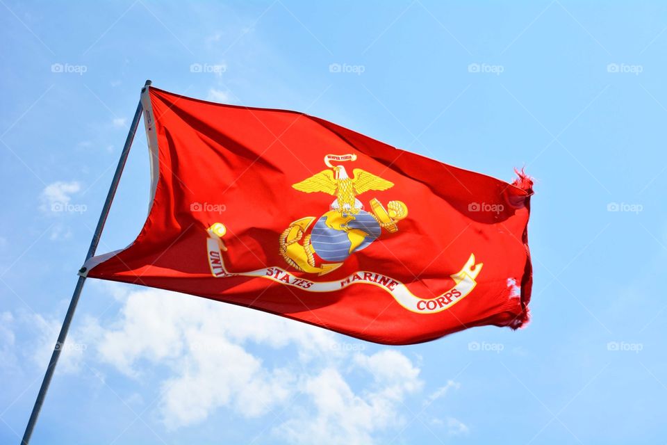 United States Marine Corps flag blows in the wind.