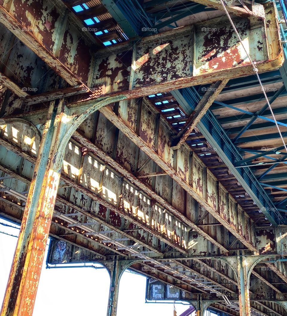 The El, underside of elevated train tracks in Brooklyn, New York