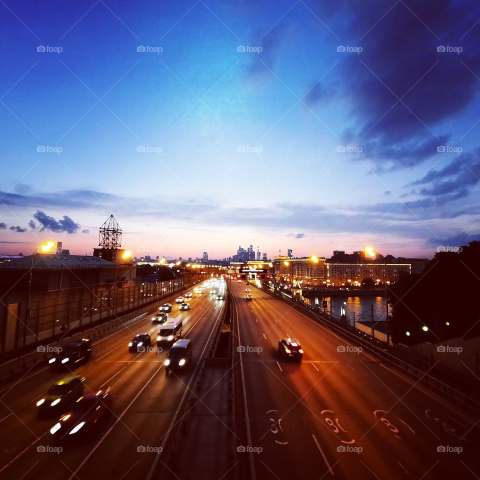 Megapolis highway in the summer evening