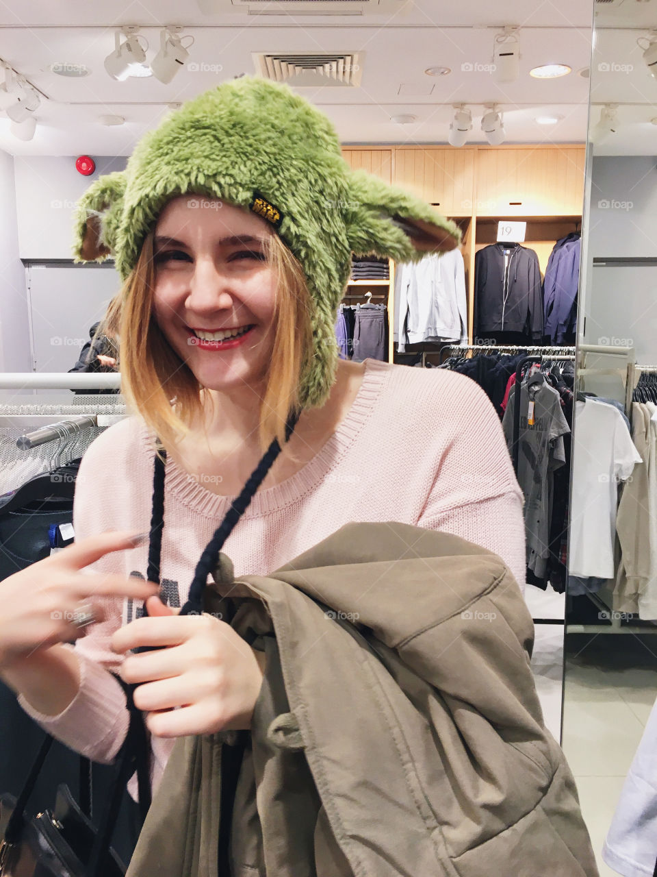 So we were shopping for clothes and she decided to try on some funny fancy hats.