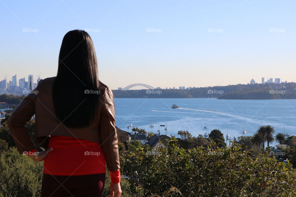 A girl watching landscape of the Watson bay side