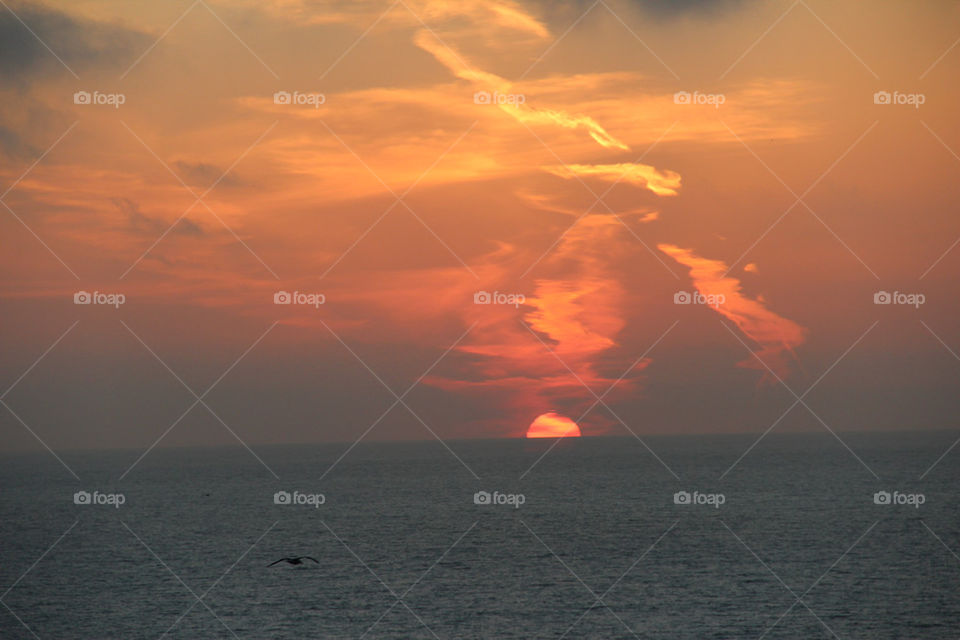 sky sunset sun water by chrisn