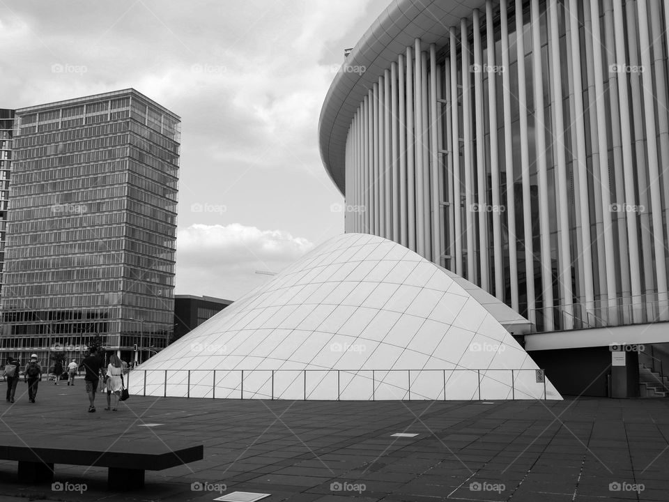 Beautiful view of the glass abstract geometric and creative modern philharmonic building in the city of Luxembourg, close-up side view. Concept architecture of modern buildings.