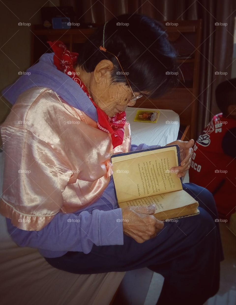 Mother is reading a book