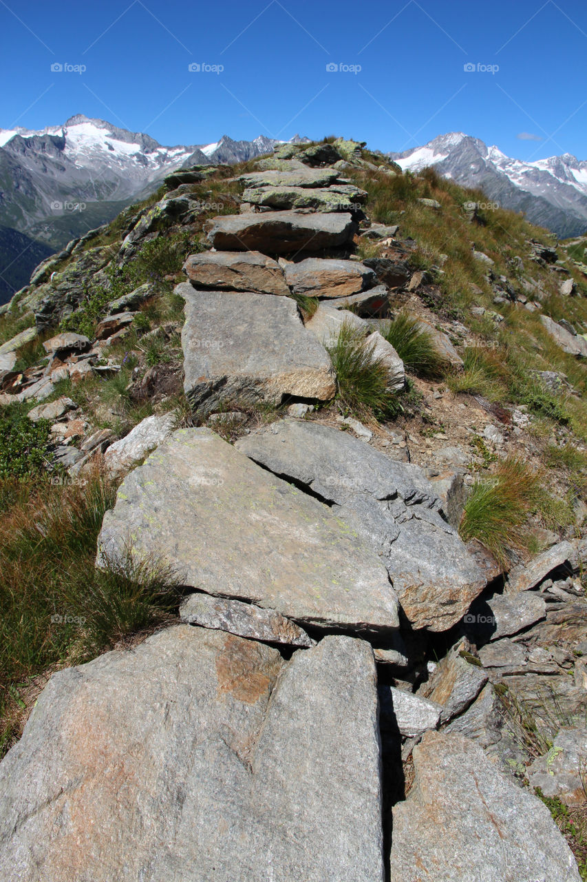 Rocky hiking trail on mountain  ridge