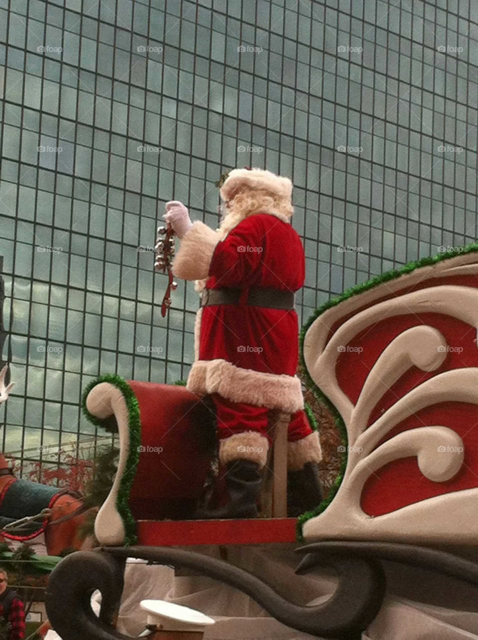 Santa Claus coming to town in parade
