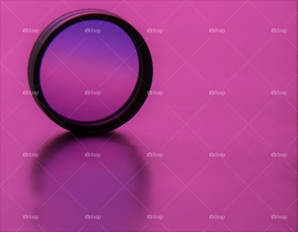 Lense in purple background 