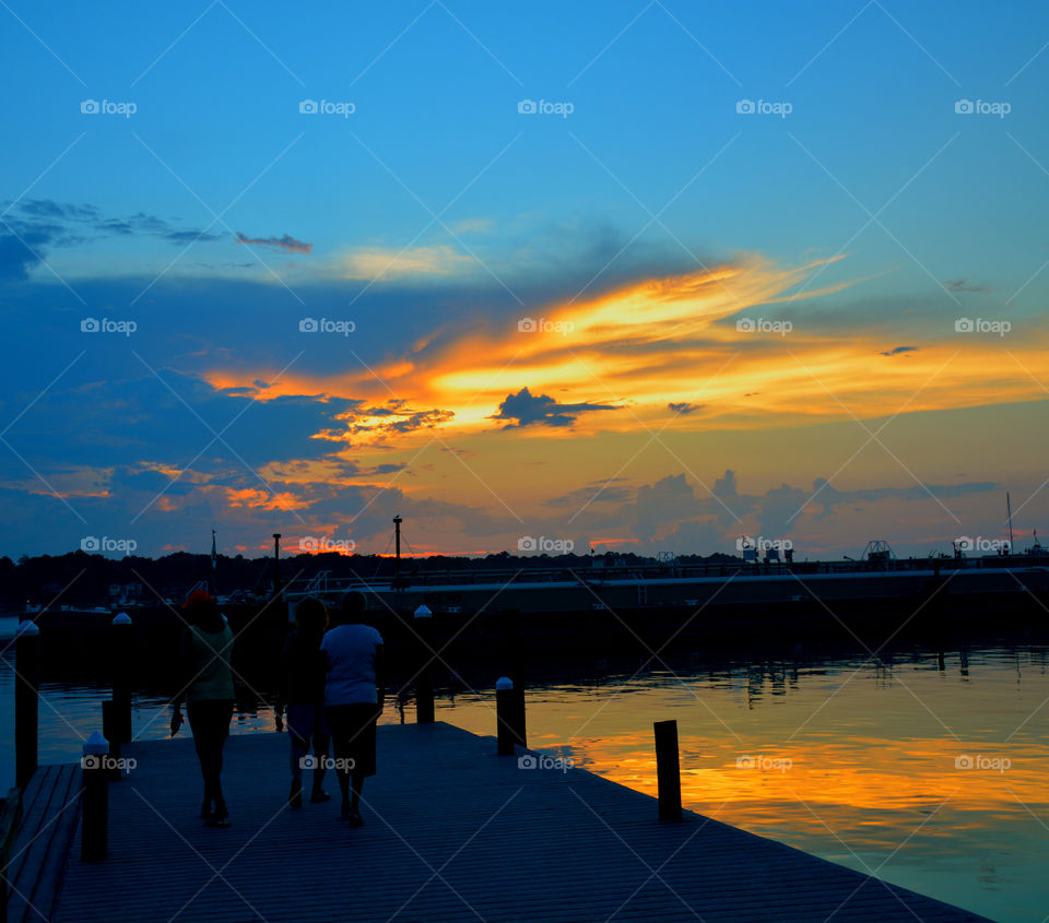 The sun is blushing today. Nimble ripples dance across the water, clear as glass, speckled with gold dust. It's reaction to the sun is fascinating! After being mesmerized temporarily, I proceed to do what I came to do, capture it's short term beauty