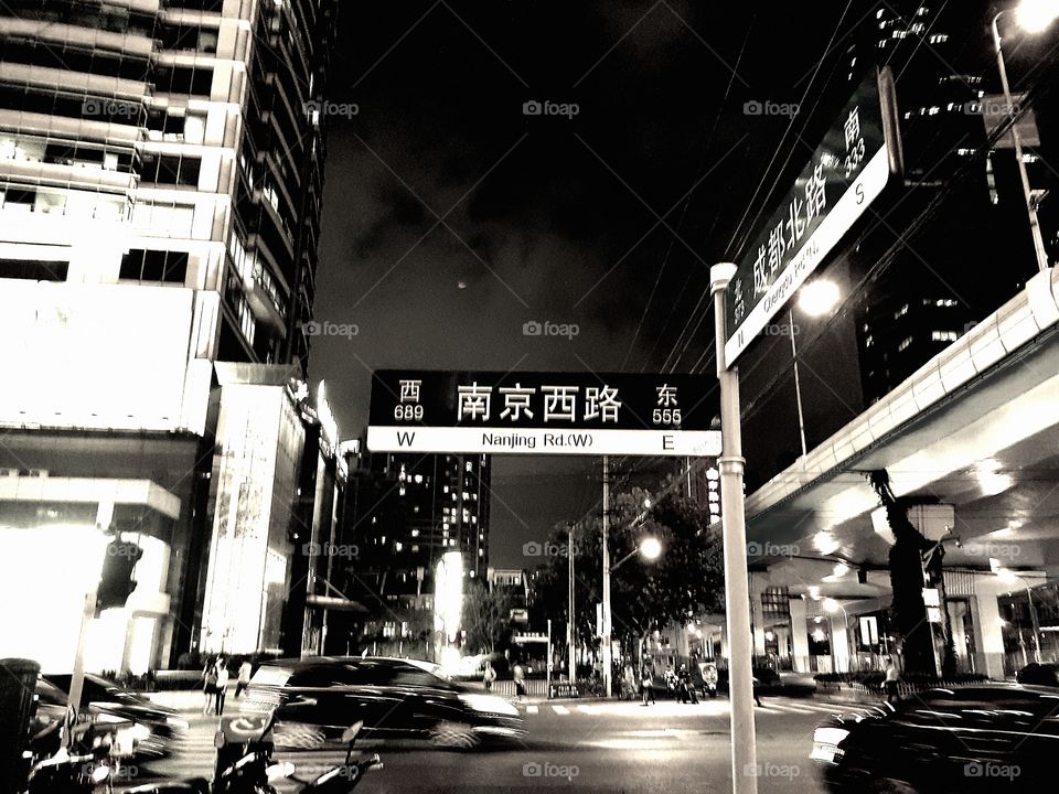 Night time street scene in central Shanghai, China.