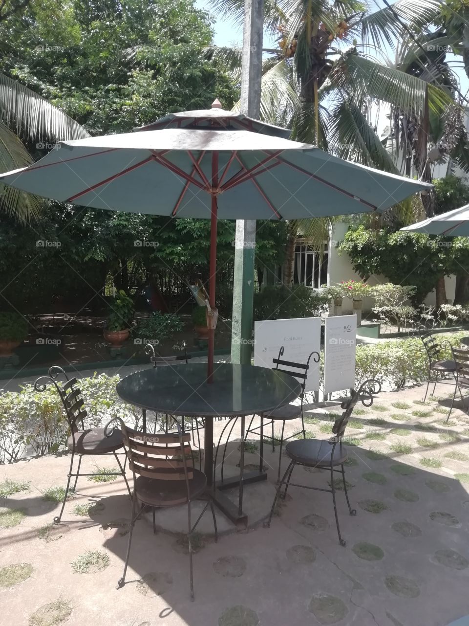 Sitting area by the side of the pool.