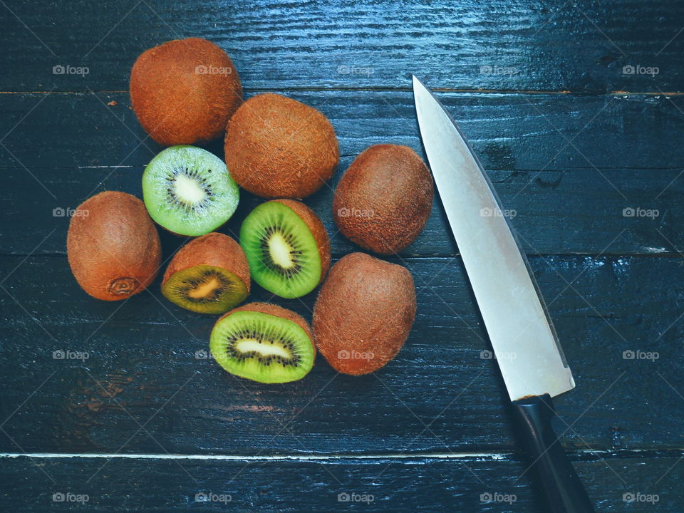 kiwi on a black background