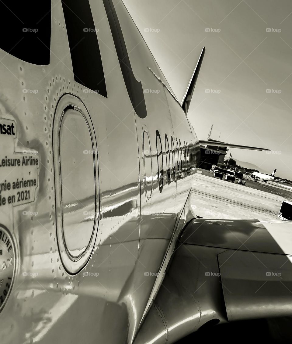 A black and white closeup leaving the plane upon arrival at Puerto Vallarta.