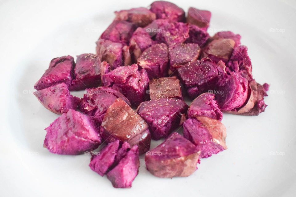 Purple Potatoes on white background