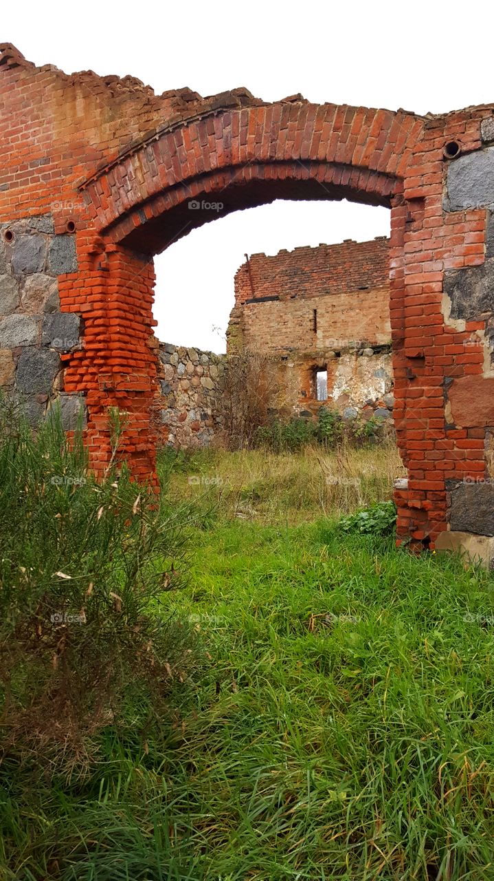 Ruins of farm buildings.