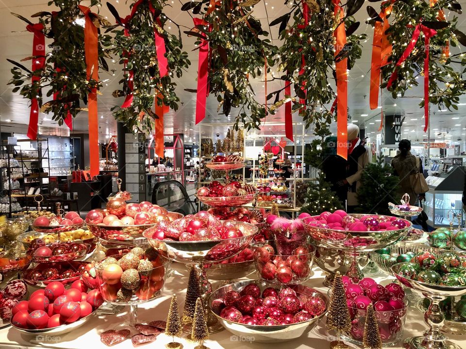 Christmas decorations and ornaments market stand, store, exposition, red Christmas decorations 