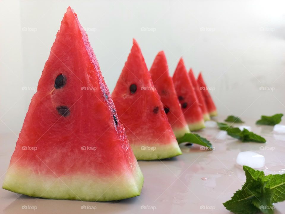 triangular slices of watermelon.