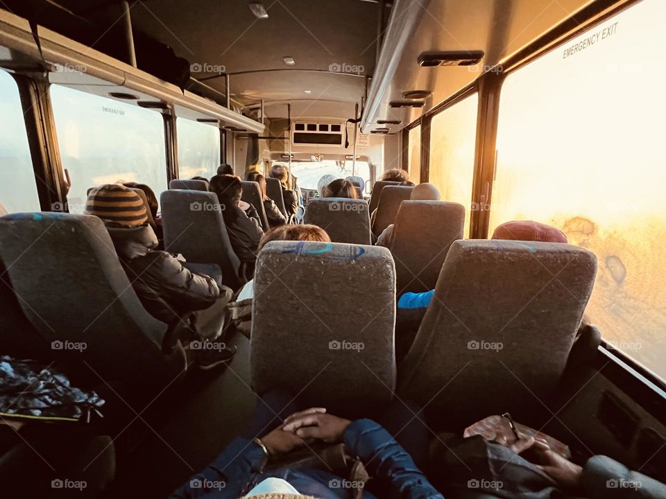 Travel by bus on early morning commute 
