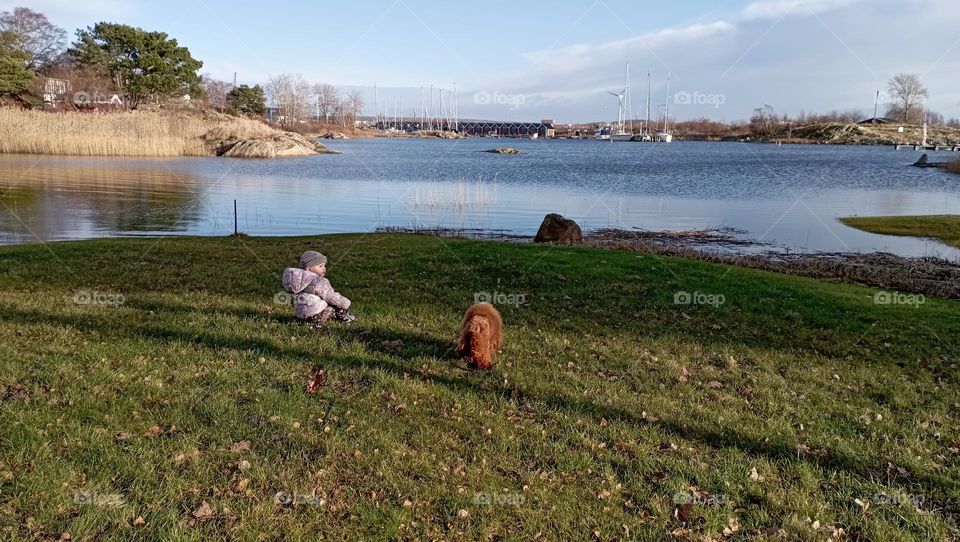 Child and dog in nature