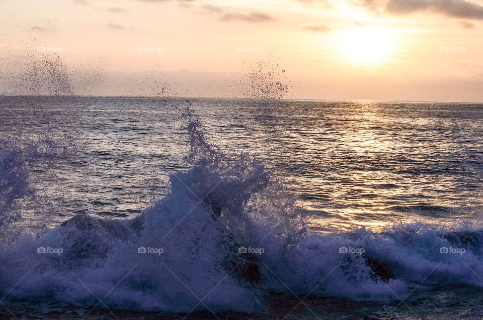 Wave crashing on rocks