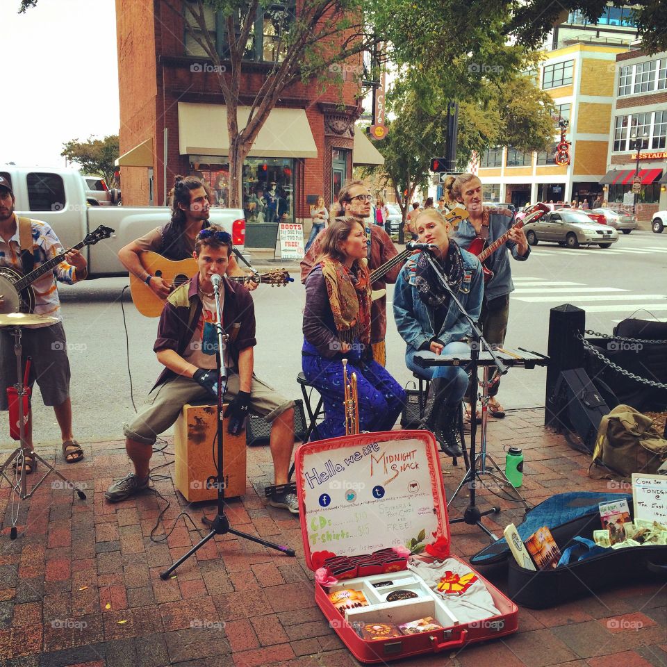 Band on street corner . Band playing on street in Nashville 