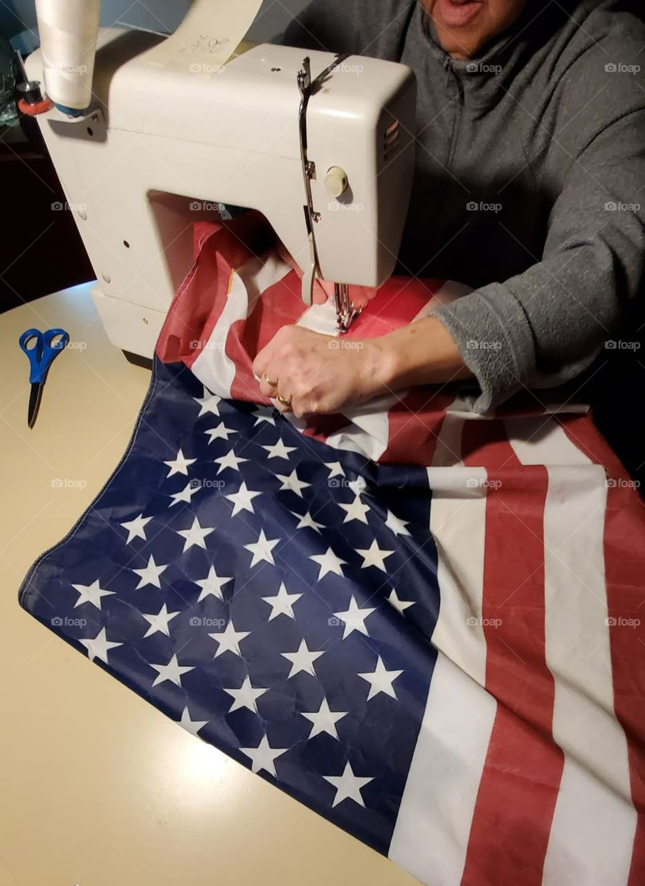Sewing worn, ripped American Flag 🇺🇸! Restoration of our flag, ripped in the wind.