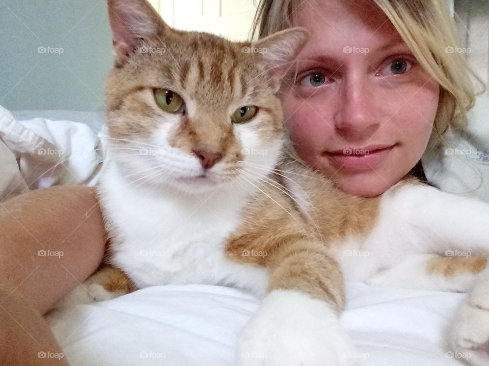 young adult female and her cat
