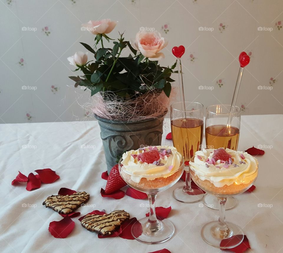 Wine glass with ice-cream on table