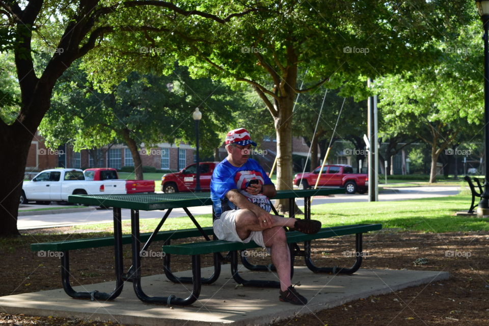 at the park. He was feeling very patriotic that day