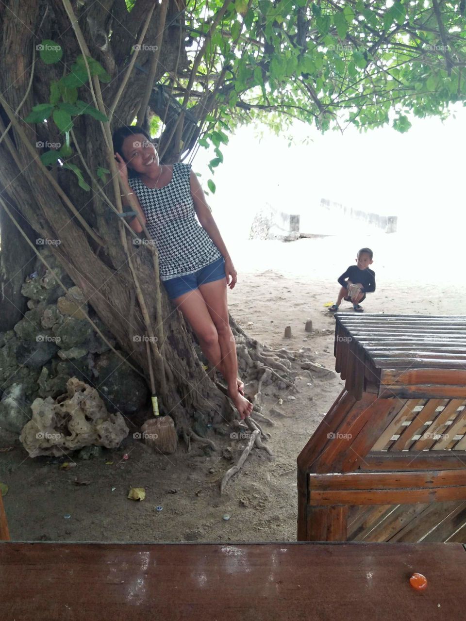 captured with the giant tree on the beach