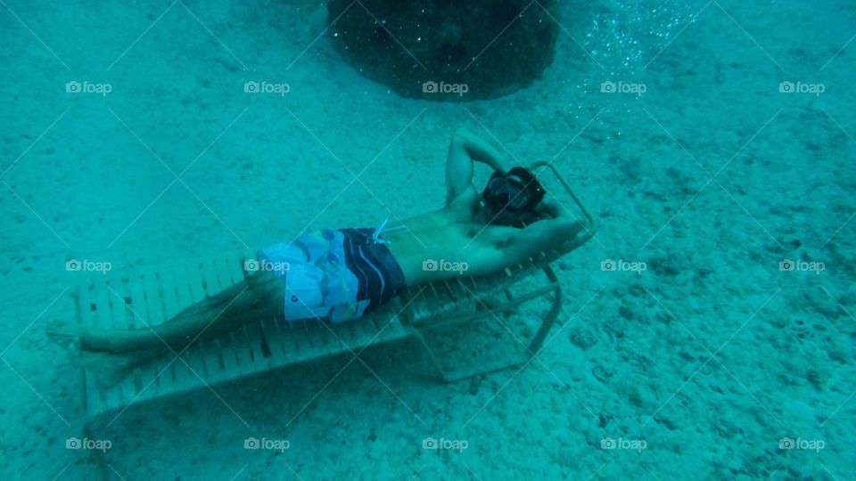 Lounging underwater Grand Cayman 
