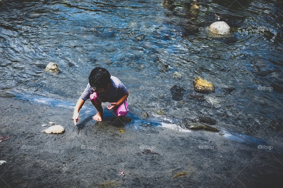 Playing at the riverside 