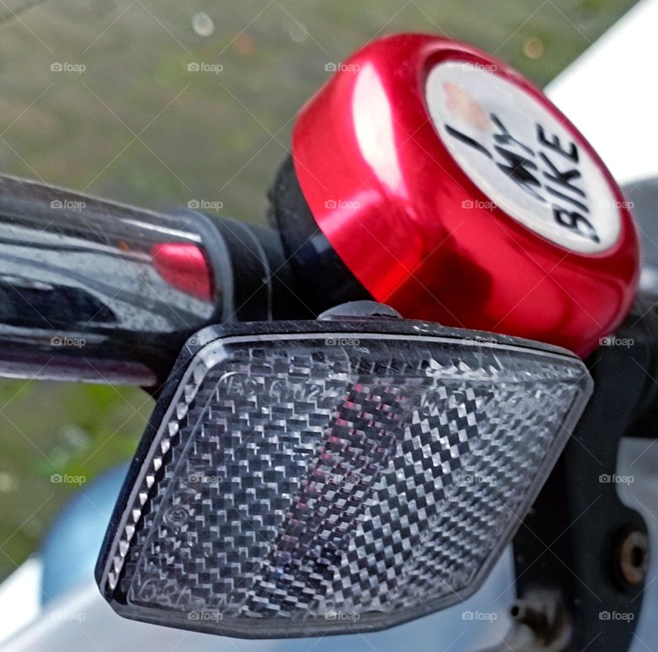 Bicycle reflector and bell