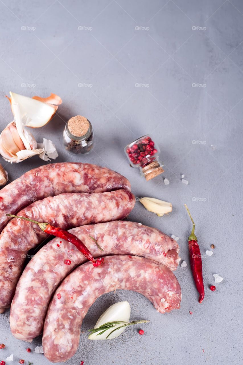 Meat sausage on table with herb 