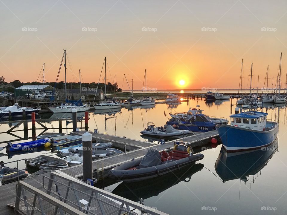 The sun setting over Yarmouth harbour,  Isle of Wight. 