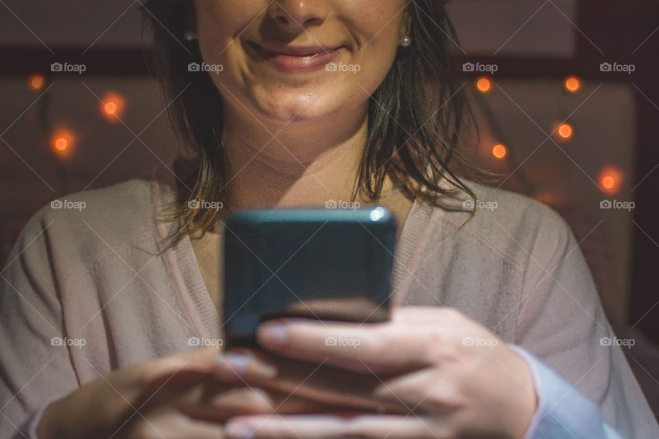 Young woman using smartphone