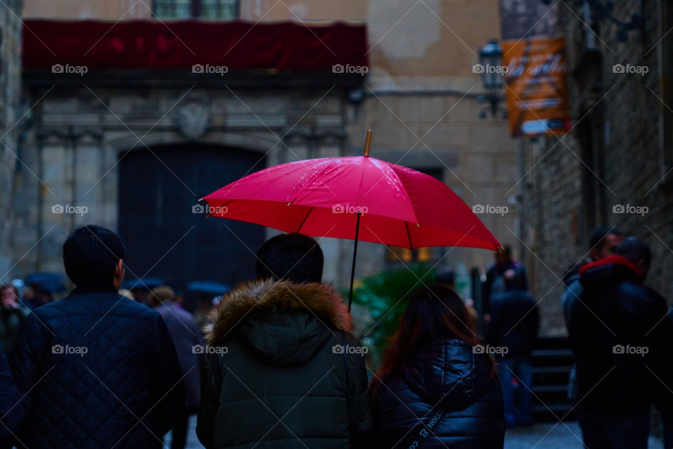 Red umbrella in a rainy day