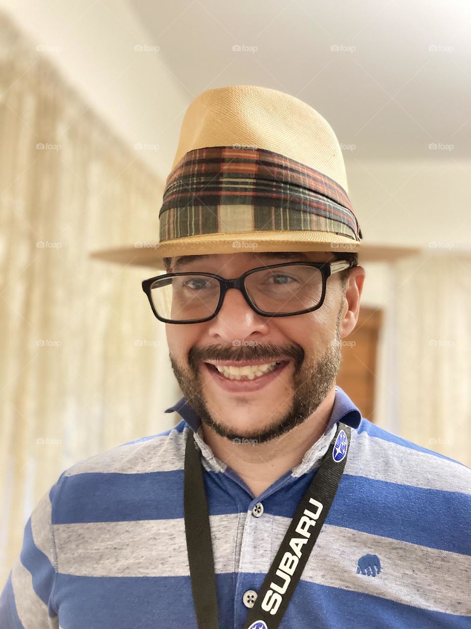 Beard contest photography mission man in a hat