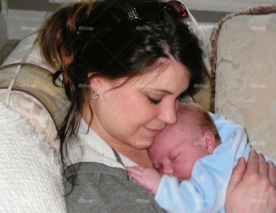 Mother holding baby boy
