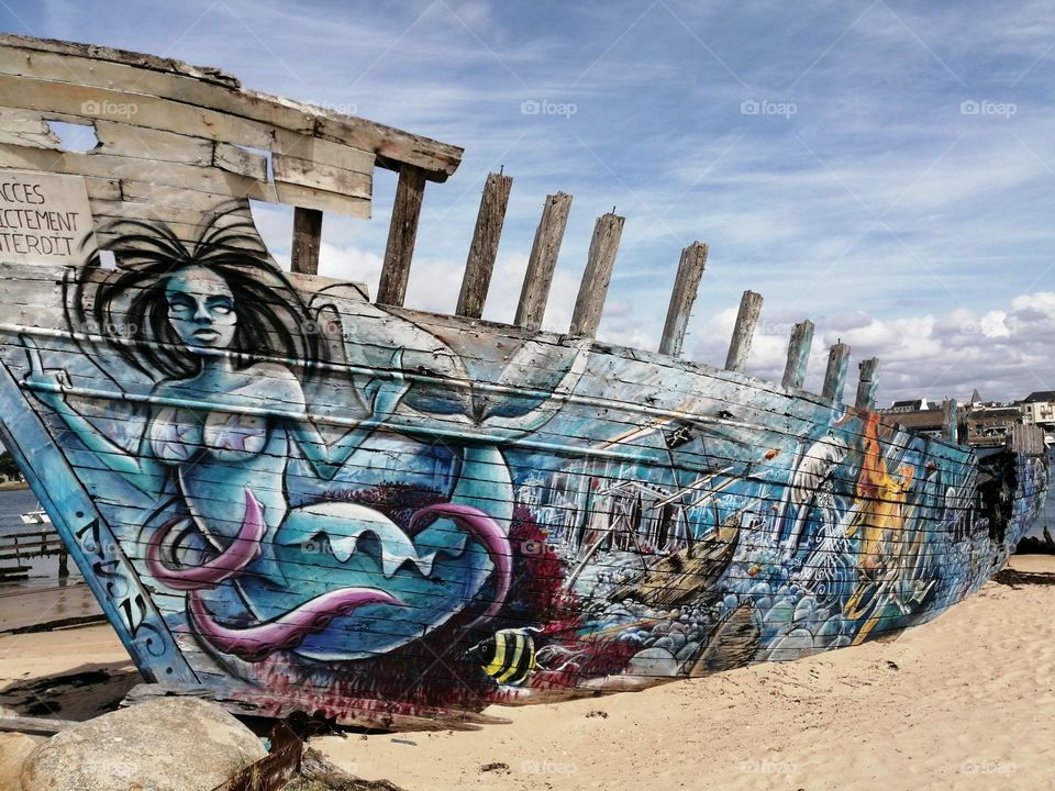 Mermaid painted on a shipwreck