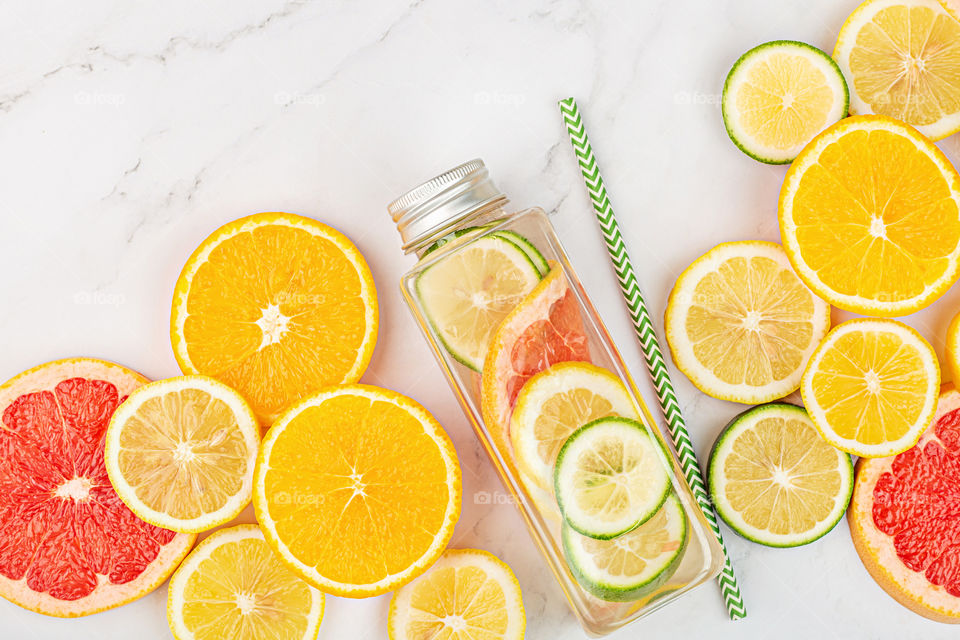 Flat lay with fresh citrus fruits