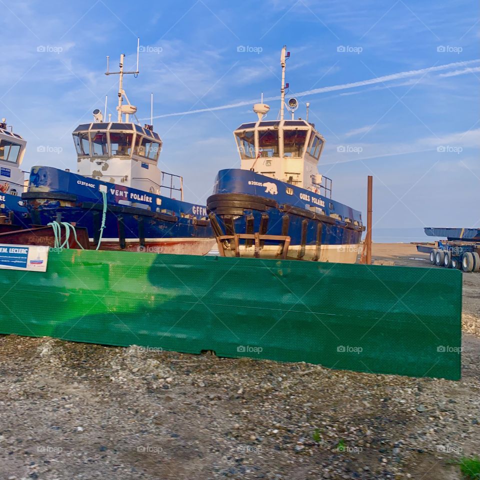 Boats docked at the dock of L’Isle-aux-Coudres, Quebec, Canada 