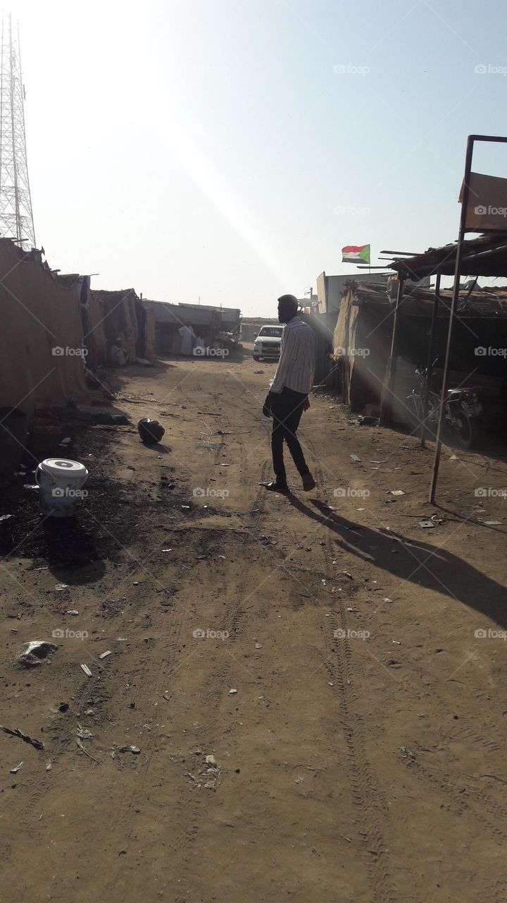 the man walking on desert