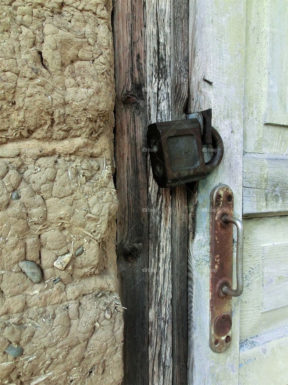 Locked padlock for two keys