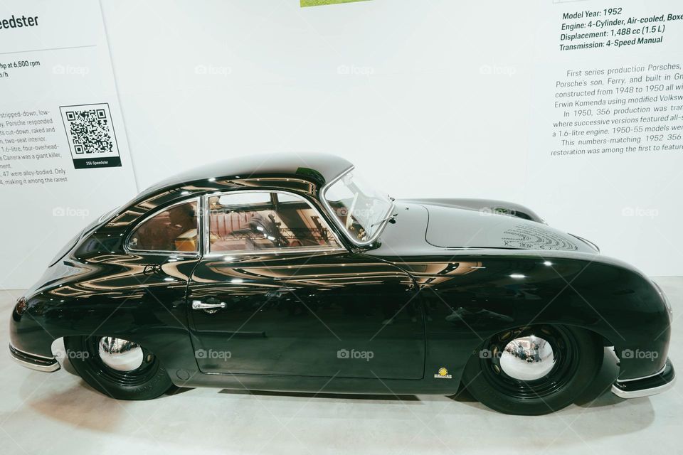 Black porsche.  Classic car.  The car that started it all.