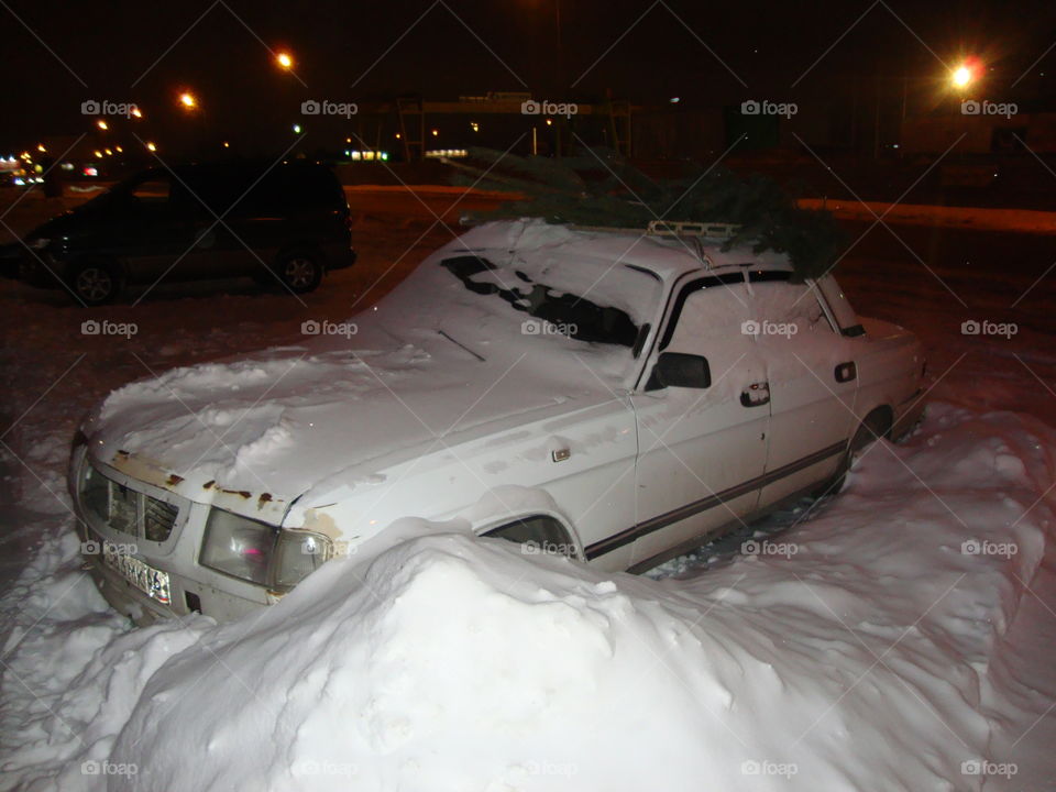 The car was covered with snow