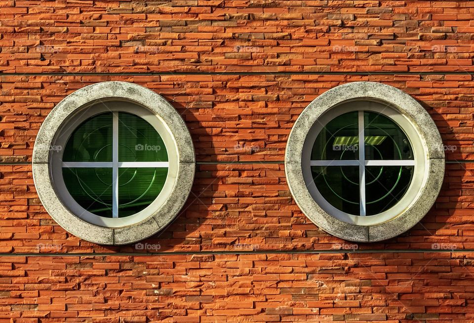 A Round Shape Windows of a Building caught my Eyes attention.